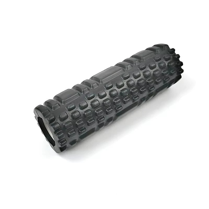 Black foam roller with textured surface on a white background