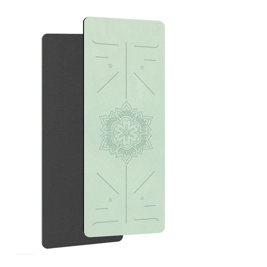 Two yoga mats, one black and one light green with a mandala design, on a white background.